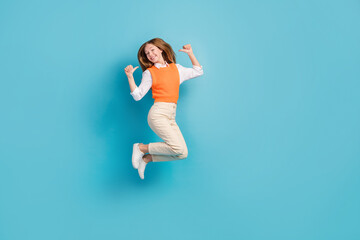 Fototapeta na wymiar Full length photo of positive joyful lady wear stylish clothes thumbs up indicating herself empty space isolated on blue color background