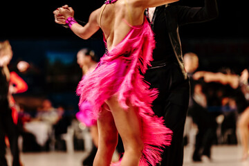 back couple dancers on background of dancers