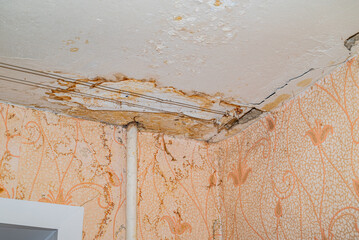 Damage ceiling from water pipelines leakage. Housing problem concep