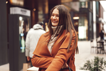 Beautiful girl stands on the street of Istanbul .