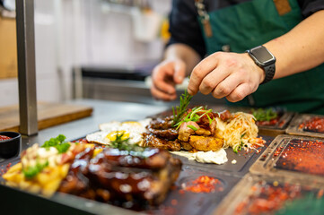 Professional chef cooking food in the kitchen restaurant