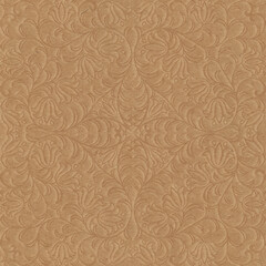 Brown cardboard background with an embossed floral pattern. Eco friendly packaging in feminine style. 