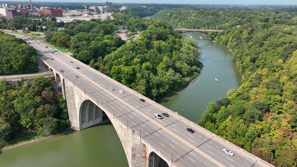Beautiful stone bridge with arches over river Veterans Memorial Bridge in Rochester New York 