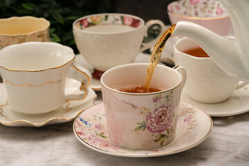 Cups of tea in porcelain cups