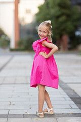 Candid portrait of cute little Caucasians blue-eyed girl with blonde hair looking at camera feel excited overjoyed with happy childhood, positive little child kid pose, children happiness concept