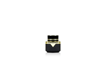 Black and Gold cosmetic cream jars isolated on white background with clipping path.