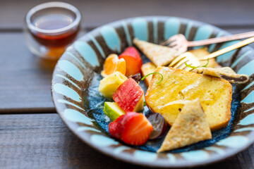 Honey Toast with lots of fruit at outdoor cafe