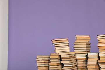 large stacks of books in the library of knowledge science literature