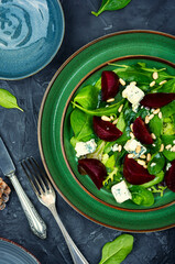 Meatless salad with beet, cheese and pine nuts,top view