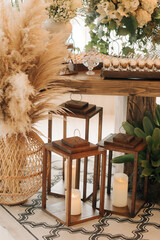 Wedding table set up in boho style with pampas grass and greenery

