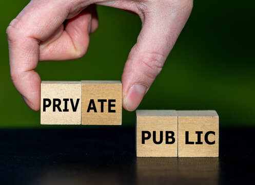 Hand selects cubes with the word private instead of cubes with the word public.