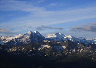 Obraz premium World famous mountain range Eiger, Monch and Jungfrau. View from Mount Brienzer Rothorn. Eiger North Face.