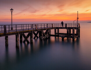 Fototapeta premium A long exposure of Victoria pier situated at the entrance to Portsmouth harbour in Hampshire, UK. Now mainly used for fishing.
