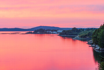 Bright sunset over Bay of Fundy and Campobello island, New Brunswick Atlantic coast, Canada
