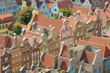 View over the red tiled roofs of historical Gdansk Old town, Poland - 572702036