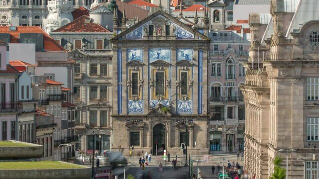 Almeida Garret Square with the Sao Bento railway station and Congregados Church at the back timelapse, Porto, Portugal. Traffic on intersection in front of the building