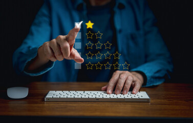 Unhappy Client hand using desktop and give one star symbol for  dissatisfied of product and service...