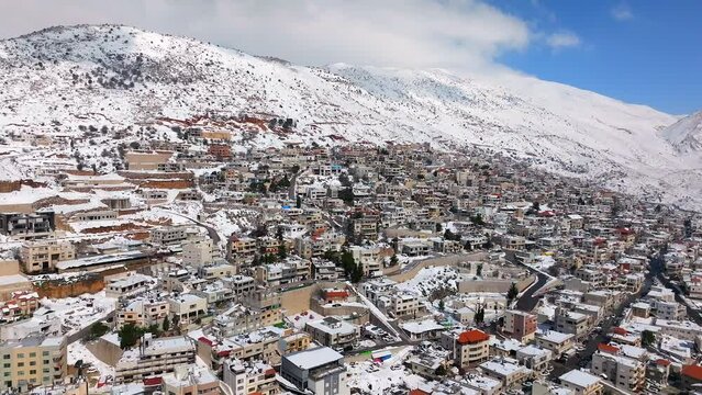 Israel Hermon mountain and town of Majdal Shams covered with snow