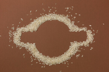 Cereals. Rice. buckwheat, oatmeal, wheat. Various types of cereals in bowls on a brown background. Healthy food. Various cereals.