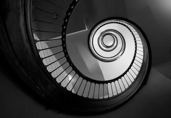Spiral black and white stairs.