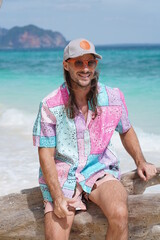 portrait of a man on the beach in krabi thailand with sunglasses, poda island, model shooting 
