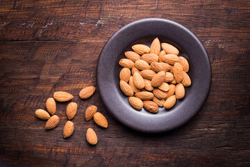 pile of natural almonds (Prunus dulcis) close-up image