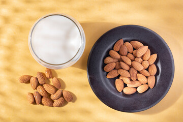 milk and almond seeds (Prunus dulcis) close-up image