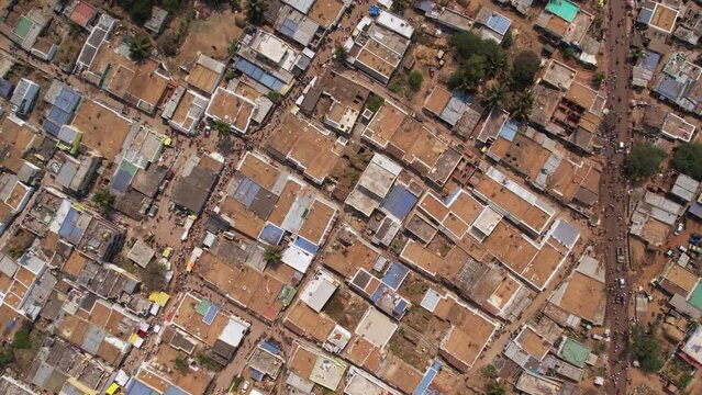 An aerial top view of an Indian village with old buildings and small streets
