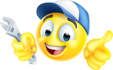A mechanic or plumber holding a spanner or wrench emoticon face emoji icon