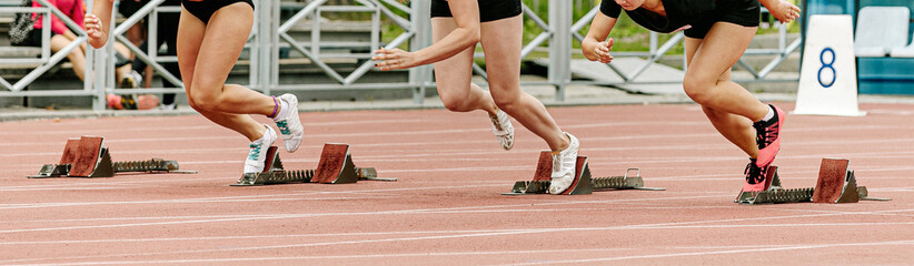 start sprint race women runners athletes in athletics competition