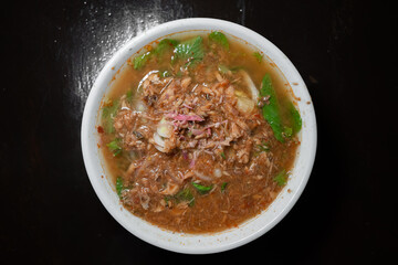 Asam Laksa, popular traditional spicy and sour vermicelli noodle soup from Malaysia