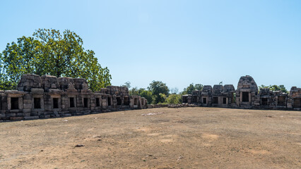 Fototapeta na wymiar Khajuraho - The ruins of Chausath Yogini Temple in the medieval temple group found at Khajuraho in Madhya Pradesh, India