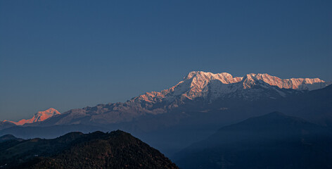 View of the Himalayan giants, Dhaulagiri mountain, Annapurna range and Machapuchare (Fish Tail) mountain as seen at sunrise from Sarangkot village, near Pokhara, Nepal Himalayas, Nepal