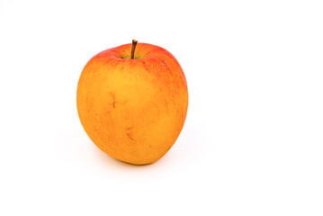 A ripe apple isolated against a white background as a studio shot