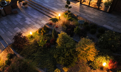 Professionally Landscaped and Illuminated Garden in the Evening