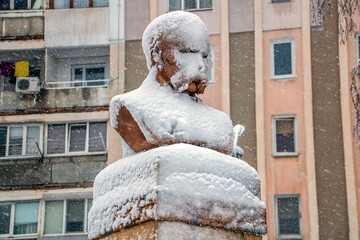 Monument to Taras Shevchenko in snow and ice in winter