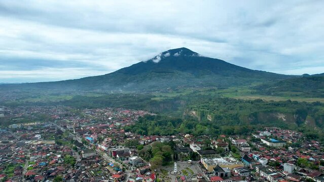 Aerial view of Jam Gadang, a historical and most famous landmark in Bukit Tinggi City, an icon of the city and the most visited tourist destination by tourists. 