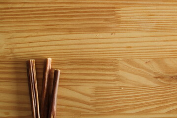 Dehydrated ox esophagus in a wooden background. Dog treats.