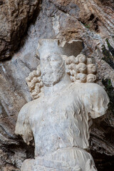 Fototapeta na wymiar Shapur I Statue out of Stalagmite, Chogan Valley, Fars, Iran
