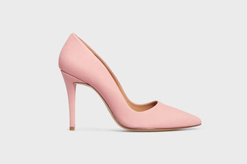 Light pink pointy toe women's shoe with high heels isolated on white background. Female classic...