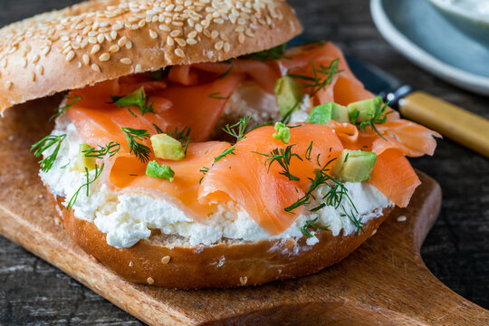 Sesame bagel with cream cheese and smoked salmon