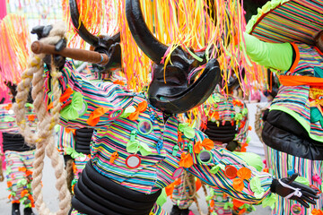 Dominican Republic Punta Cana Annual Carnival. A man in a carnival costume and mask.
