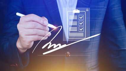 Electronic Signature Concept, Electronic Signing Businessman signs electronic documents on digital...