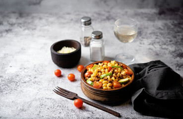 Minced beef zucchini tomatoes pasta in a plate