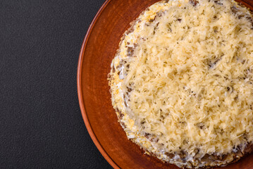 Delicious fresh pie with chicken liver, eggs, onions, carrots and mayonnaise