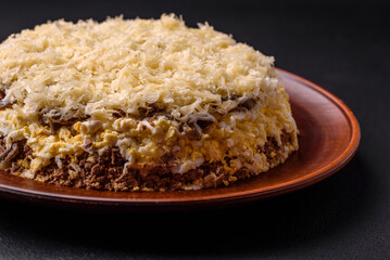 Delicious fresh pie with chicken liver, eggs, onions, carrots and mayonnaise