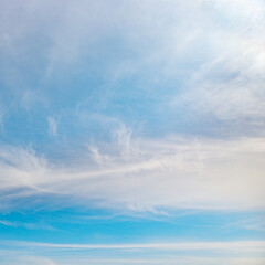 Beautiful white clouds on bright blue sky