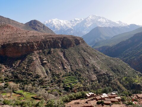 Panoramic view of snow-capped High Atlas Mountains in Ourika valley, Morocco.