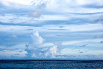 Obraz premium Beautiful clouds sunset light on blue sky with pink hues in asia on Bali island