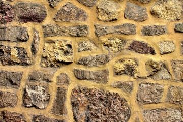 Texture of stone wall on gothic medieval cathedral.